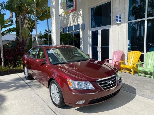 2010 Dark Cherry Red /Camel Hyundai Sonata Limited LOW MILES 27,381 1 OWNER (5NPEU4AF7AH) with an 3.3L DOHC V6 Engine engine, Automatic transmission, located at 4701 North Dixie Hwy, Pompano Beach, FL, 33064, (954) 422-2889, 26.240938, -80.123474 - OUR WEBPAGE FLORIDACARS1.COM HAS OVER 100 PHOTOS AND FREE CARFAX LINK 2010 Hyundai Sonata Limited V6 1 OWNER Sedan 4 DR 3.3L V6 F DOHC 24V Gasoline 29 MPG Front Wheel Drive Features ABS Brakes Air Conditioning Alloy Wheels AM/FM Stereo Automatic Transmission Auxiliary Audio Input CD Audio Cruise Con- Photo#1