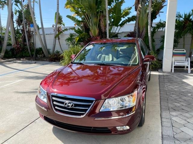 2010 Dark Cherry Red /Camel Hyundai Sonata Limited LOW MILES 27,381 1 OWNER (5NPEU4AF7AH) with an 3.3L DOHC V6 Engine engine, Automatic transmission, located at 4701 North Dixie Hwy, Pompano Beach, FL, 33064, (954) 422-2889, 26.240938, -80.123474 - OUR WEBPAGE FLORIDACARS1.COM HAS OVER 100 PHOTOS AND FREE CARFAX LINK 2010 Hyundai Sonata Limited V6 1 OWNER Sedan 4 DR 3.3L V6 F DOHC 24V Gasoline 29 MPG Front Wheel Drive Features ABS Brakes Air Conditioning Alloy Wheels AM/FM Stereo Automatic Transmission Auxiliary Audio Input CD Audio Cruise Con- Photo#3