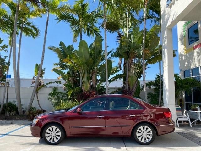 2010 Dark Cherry Red /Camel Hyundai Sonata Limited LOW MILES 27,381 1 OWNER (5NPEU4AF7AH) with an 3.3L DOHC V6 Engine engine, Automatic transmission, located at 4701 North Dixie Hwy, Pompano Beach, FL, 33064, (954) 422-2889, 26.240938, -80.123474 - OUR WEBPAGE FLORIDACARS1.COM HAS OVER 100 PHOTOS AND FREE CARFAX LINK 2010 Hyundai Sonata Limited V6 1 OWNER Sedan 4 DR 3.3L V6 F DOHC 24V Gasoline 29 MPG Front Wheel Drive Features ABS Brakes Air Conditioning Alloy Wheels AM/FM Stereo Automatic Transmission Auxiliary Audio Input CD Audio Cruise Con- Photo#4