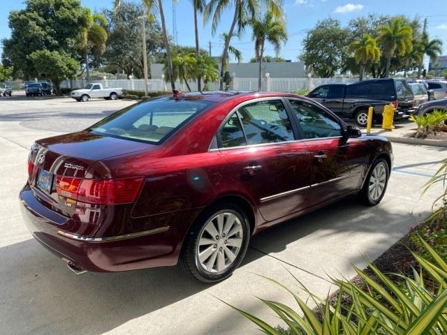 2010 Dark Cherry Red /Camel Hyundai Sonata Limited LOW MILES 27,381 1 OWNER (5NPEU4AF7AH) with an 3.3L DOHC V6 Engine engine, Automatic transmission, located at 4701 North Dixie Hwy, Pompano Beach, FL, 33064, (954) 422-2889, 26.240938, -80.123474 - OUR WEBPAGE FLORIDACARS1.COM HAS OVER 100 PHOTOS AND FREE CARFAX LINK 2010 Hyundai Sonata Limited V6 1 OWNER Sedan 4 DR 3.3L V6 F DOHC 24V Gasoline 29 MPG Front Wheel Drive Features ABS Brakes Air Conditioning Alloy Wheels AM/FM Stereo Automatic Transmission Auxiliary Audio Input CD Audio Cruise Con- Photo#7