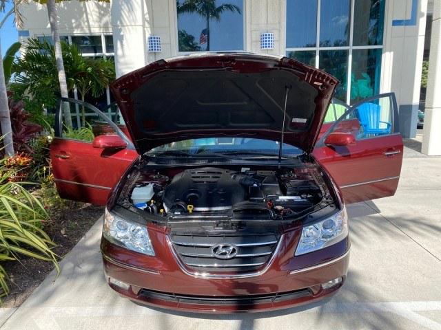 2010 Dark Cherry Red /Camel Hyundai Sonata Limited LOW MILES 27,381 1 OWNER (5NPEU4AF7AH) with an 3.3L DOHC V6 Engine engine, Automatic transmission, located at 4701 North Dixie Hwy, Pompano Beach, FL, 33064, (954) 422-2889, 26.240938, -80.123474 - OUR WEBPAGE FLORIDACARS1.COM HAS OVER 100 PHOTOS AND FREE CARFAX LINK 2010 Hyundai Sonata Limited V6 1 OWNER Sedan 4 DR 3.3L V6 F DOHC 24V Gasoline 29 MPG Front Wheel Drive Features ABS Brakes Air Conditioning Alloy Wheels AM/FM Stereo Automatic Transmission Auxiliary Audio Input CD Audio Cruise Con- Photo#17