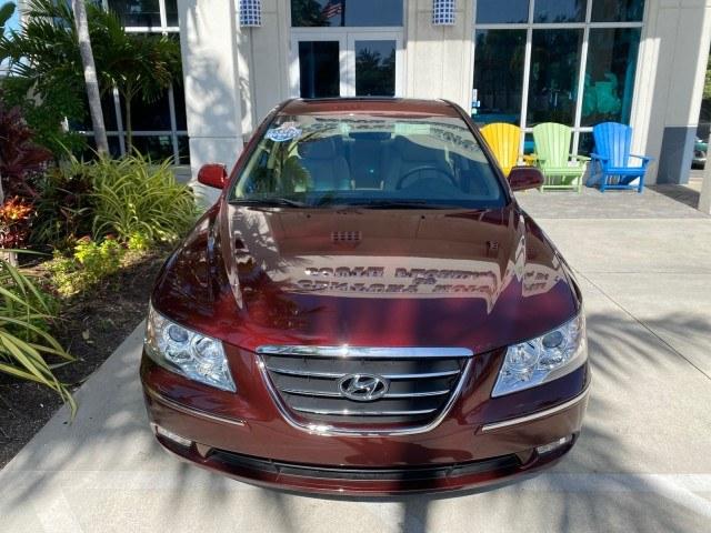 2010 Dark Cherry Red /Camel Hyundai Sonata Limited LOW MILES 27,381 1 OWNER (5NPEU4AF7AH) with an 3.3L DOHC V6 Engine engine, Automatic transmission, located at 4701 North Dixie Hwy, Pompano Beach, FL, 33064, (954) 422-2889, 26.240938, -80.123474 - OUR WEBPAGE FLORIDACARS1.COM HAS OVER 100 PHOTOS AND FREE CARFAX LINK 2010 Hyundai Sonata Limited V6 1 OWNER Sedan 4 DR 3.3L V6 F DOHC 24V Gasoline 29 MPG Front Wheel Drive Features ABS Brakes Air Conditioning Alloy Wheels AM/FM Stereo Automatic Transmission Auxiliary Audio Input CD Audio Cruise Con- Photo#27
