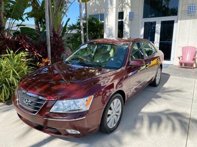 2010 Dark Cherry Red /Camel Hyundai Sonata Limited LOW MILES 27,381 1 OWNER (5NPEU4AF7AH) with an 3.3L DOHC V6 Engine engine, Automatic transmission, located at 4701 North Dixie Hwy, Pompano Beach, FL, 33064, (954) 422-2889, 26.240938, -80.123474 - OUR WEBPAGE FLORIDACARS1.COM HAS OVER 100 PHOTOS AND FREE CARFAX LINK 2010 Hyundai Sonata Limited V6 1 OWNER Sedan 4 DR 3.3L V6 F DOHC 24V Gasoline 29 MPG Front Wheel Drive Features ABS Brakes Air Conditioning Alloy Wheels AM/FM Stereo Automatic Transmission Auxiliary Audio Input CD Audio Cruise Con- Photo#29