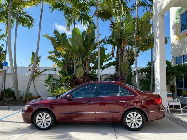 2010 Dark Cherry Red /Camel Hyundai Sonata Limited LOW MILES 27,381 1 OWNER (5NPEU4AF7AH) with an 3.3L DOHC V6 Engine engine, Automatic transmission, located at 4701 North Dixie Hwy, Pompano Beach, FL, 33064, (954) 422-2889, 26.240938, -80.123474 - OUR WEBPAGE FLORIDACARS1.COM HAS OVER 100 PHOTOS AND FREE CARFAX LINK 2010 Hyundai Sonata Limited V6 1 OWNER Sedan 4 DR 3.3L V6 F DOHC 24V Gasoline 29 MPG Front Wheel Drive Features ABS Brakes Air Conditioning Alloy Wheels AM/FM Stereo Automatic Transmission Auxiliary Audio Input CD Audio Cruise Con- Photo#30