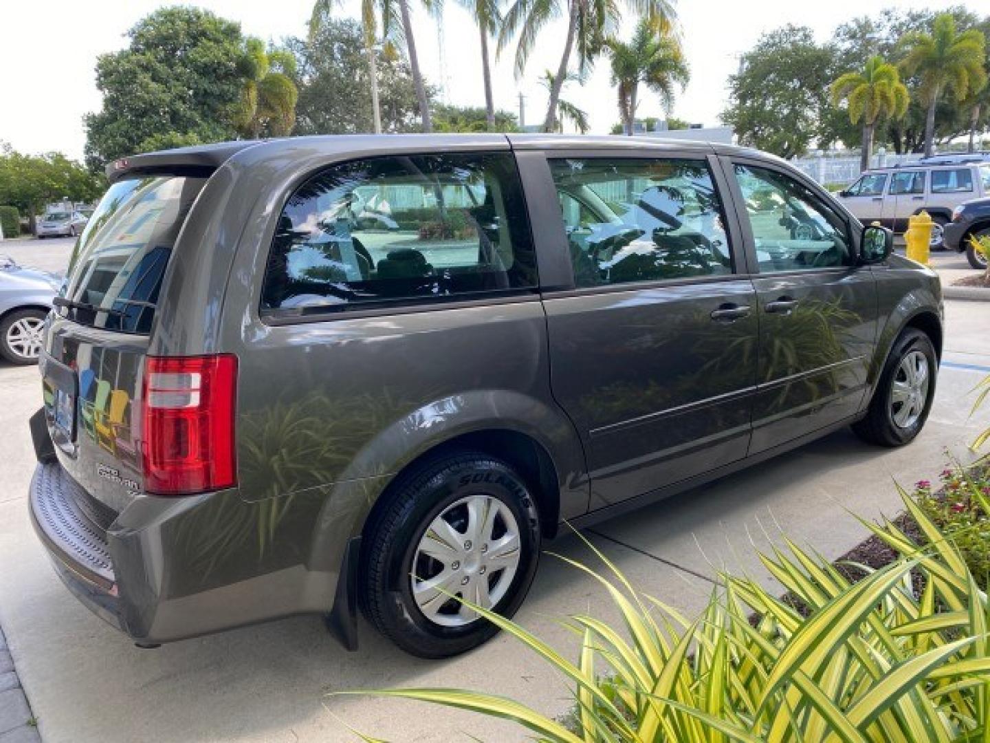 2010 Dark Titanium Metallic /Medium Slate Gray/Light Shale Dodge Grand Caravan SE LOW MILES 36,541 (2D4RN4DE9AR) with an 3.3L OHV V6 Engine engine, Automatic transmission, located at 4701 North Dixie Hwy, Pompano Beach, FL, 33064, (954) 422-2889, 26.240938, -80.123474 - OUR WEBPAGE FLORIDACARS1.COM HAS OVER 100 PHOTOS AND FREE CARFAX LINK 2010 Dodge Grand Caravan SE Van 3.3L V6 F OHV 12V Gasoline 24 MPG Front Wheel Drive Features ABS Brakes Air Conditioning AM/FM Stereo Automatic Transmission Auxiliary Audio Input CD Audio Cloth Seats Cruise Control Flex Fuel Vehic- Photo#7
