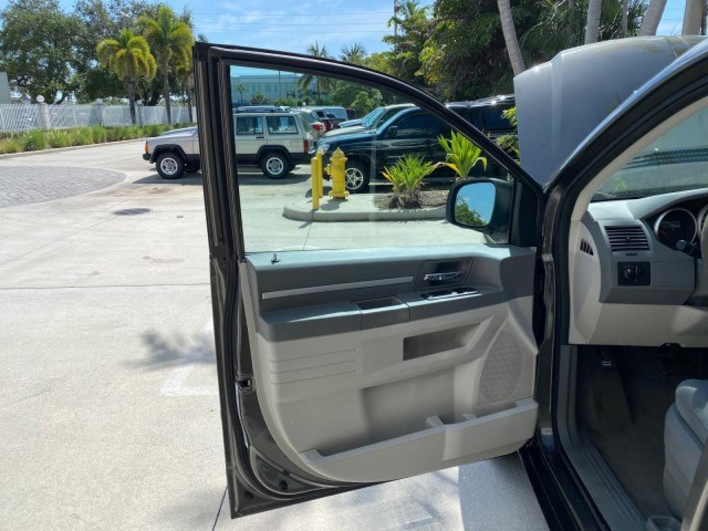 2010 Dark Titanium Metallic /Medium Slate Gray/Light Shale Dodge Grand Caravan SE LOW MILES 36,541 (2D4RN4DE9AR) with an 3.3L OHV V6 Engine engine, Automatic transmission, located at 4701 North Dixie Hwy, Pompano Beach, FL, 33064, (954) 422-2889, 26.240938, -80.123474 - OUR WEBPAGE FLORIDACARS1.COM HAS OVER 100 PHOTOS AND FREE CARFAX LINK 2010 Dodge Grand Caravan SE Van 3.3L V6 F OHV 12V Gasoline 24 MPG Front Wheel Drive Features ABS Brakes Air Conditioning AM/FM Stereo Automatic Transmission Auxiliary Audio Input CD Audio Cloth Seats Cruise Control Flex Fuel Vehic- Photo#9