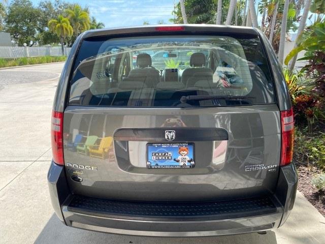 2010 Dark Titanium Metallic /Medium Slate Gray/Light Shale Dodge Grand Caravan SE LOW MILES 36,541 (2D4RN4DE9AR) with an 3.3L OHV V6 Engine engine, Automatic transmission, located at 4701 North Dixie Hwy, Pompano Beach, FL, 33064, (954) 422-2889, 26.240938, -80.123474 - OUR WEBPAGE FLORIDACARS1.COM HAS OVER 100 PHOTOS AND FREE CARFAX LINK 2010 Dodge Grand Caravan SE Van 3.3L V6 F OHV 12V Gasoline 24 MPG Front Wheel Drive Features ABS Brakes Air Conditioning AM/FM Stereo Automatic Transmission Auxiliary Audio Input CD Audio Cloth Seats Cruise Control Flex Fuel Vehic- Photo#35