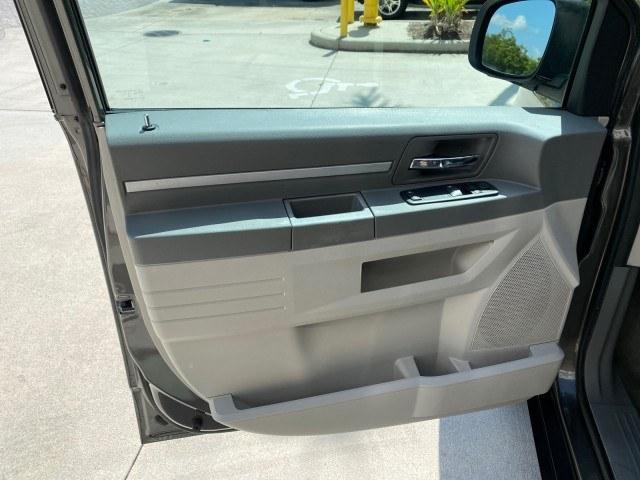 2010 Dark Titanium Metallic /Medium Slate Gray/Light Shale Dodge Grand Caravan SE LOW MILES 36,541 (2D4RN4DE9AR) with an 3.3L OHV V6 Engine engine, Automatic transmission, located at 4701 North Dixie Hwy, Pompano Beach, FL, 33064, (954) 422-2889, 26.240938, -80.123474 - OUR WEBPAGE FLORIDACARS1.COM HAS OVER 100 PHOTOS AND FREE CARFAX LINK 2010 Dodge Grand Caravan SE Van 3.3L V6 F OHV 12V Gasoline 24 MPG Front Wheel Drive Features ABS Brakes Air Conditioning AM/FM Stereo Automatic Transmission Auxiliary Audio Input CD Audio Cloth Seats Cruise Control Flex Fuel Vehic- Photo#40