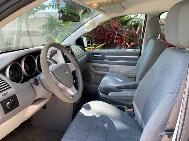 2010 Dark Titanium Metallic /Medium Slate Gray/Light Shale Dodge Grand Caravan SE LOW MILES 36,541 (2D4RN4DE9AR) with an 3.3L OHV V6 Engine engine, Automatic transmission, located at 4701 North Dixie Hwy, Pompano Beach, FL, 33064, (954) 422-2889, 26.240938, -80.123474 - OUR WEBPAGE FLORIDACARS1.COM HAS OVER 100 PHOTOS AND FREE CARFAX LINK 2010 Dodge Grand Caravan SE Van 3.3L V6 F OHV 12V Gasoline 24 MPG Front Wheel Drive Features ABS Brakes Air Conditioning AM/FM Stereo Automatic Transmission Auxiliary Audio Input CD Audio Cloth Seats Cruise Control Flex Fuel Vehic- Photo#44