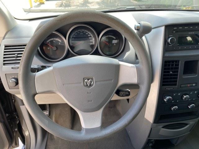 2010 Dark Titanium Metallic /Medium Slate Gray/Light Shale Dodge Grand Caravan SE LOW MILES 36,541 (2D4RN4DE9AR) with an 3.3L OHV V6 Engine engine, Automatic transmission, located at 4701 North Dixie Hwy, Pompano Beach, FL, 33064, (954) 422-2889, 26.240938, -80.123474 - OUR WEBPAGE FLORIDACARS1.COM HAS OVER 100 PHOTOS AND FREE CARFAX LINK 2010 Dodge Grand Caravan SE Van 3.3L V6 F OHV 12V Gasoline 24 MPG Front Wheel Drive Features ABS Brakes Air Conditioning AM/FM Stereo Automatic Transmission Auxiliary Audio Input CD Audio Cloth Seats Cruise Control Flex Fuel Vehic- Photo#48