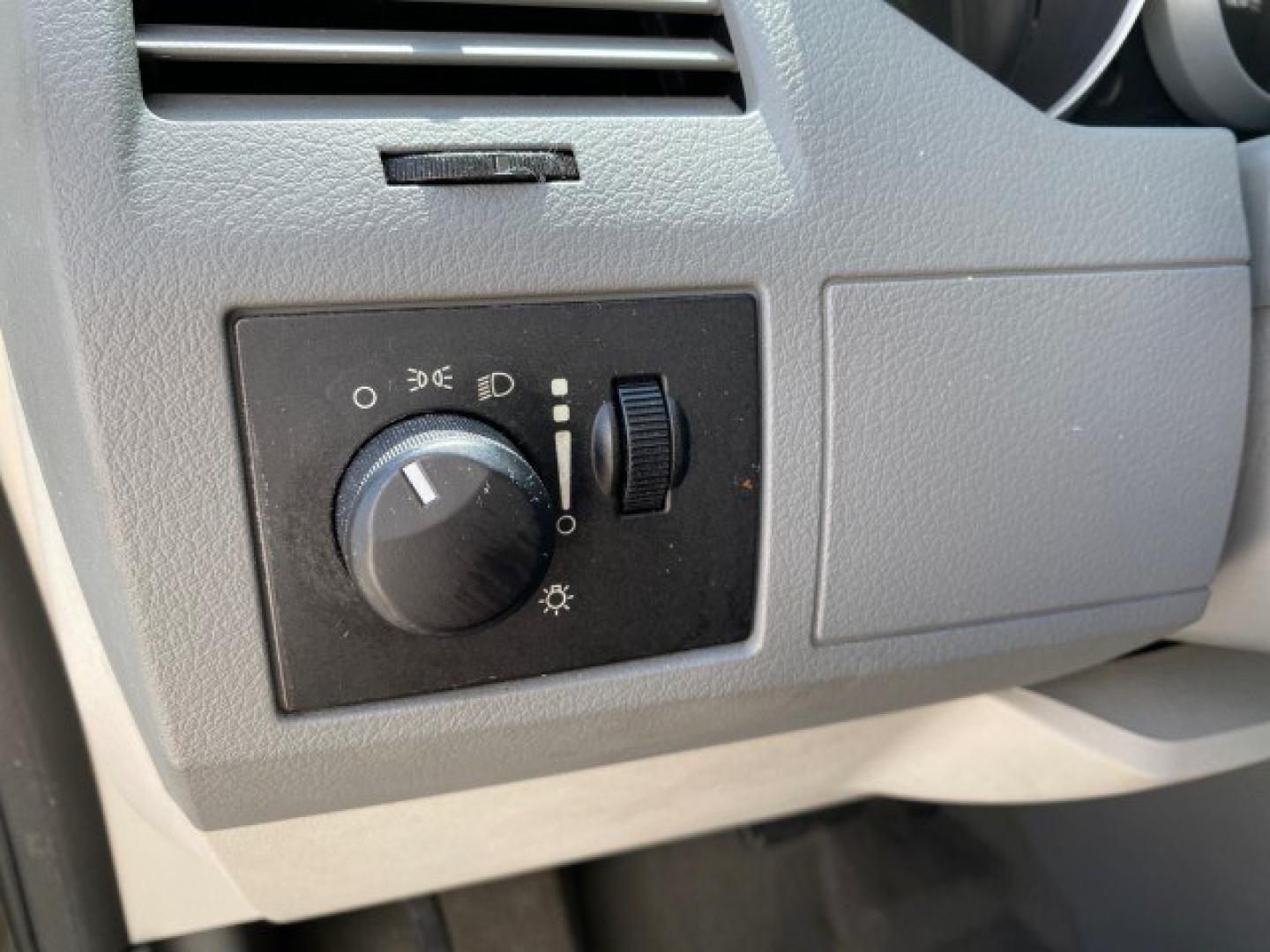 2010 Dark Titanium Metallic /Medium Slate Gray/Light Shale Dodge Grand Caravan SE LOW MILES 36,541 (2D4RN4DE9AR) with an 3.3L OHV V6 Engine engine, Automatic transmission, located at 4701 North Dixie Hwy, Pompano Beach, FL, 33064, (954) 422-2889, 26.240938, -80.123474 - OUR WEBPAGE FLORIDACARS1.COM HAS OVER 100 PHOTOS AND FREE CARFAX LINK 2010 Dodge Grand Caravan SE Van 3.3L V6 F OHV 12V Gasoline 24 MPG Front Wheel Drive Features ABS Brakes Air Conditioning AM/FM Stereo Automatic Transmission Auxiliary Audio Input CD Audio Cloth Seats Cruise Control Flex Fuel Vehic- Photo#52