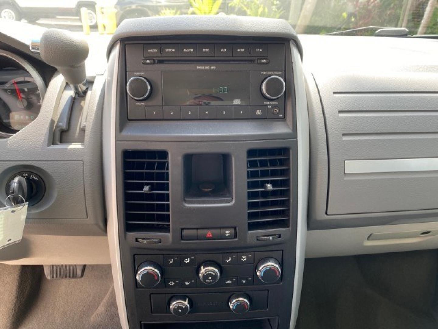 2010 Dark Titanium Metallic /Medium Slate Gray/Light Shale Dodge Grand Caravan SE LOW MILES 36,541 (2D4RN4DE9AR) with an 3.3L OHV V6 Engine engine, Automatic transmission, located at 4701 North Dixie Hwy, Pompano Beach, FL, 33064, (954) 422-2889, 26.240938, -80.123474 - OUR WEBPAGE FLORIDACARS1.COM HAS OVER 100 PHOTOS AND FREE CARFAX LINK 2010 Dodge Grand Caravan SE Van 3.3L V6 F OHV 12V Gasoline 24 MPG Front Wheel Drive Features ABS Brakes Air Conditioning AM/FM Stereo Automatic Transmission Auxiliary Audio Input CD Audio Cloth Seats Cruise Control Flex Fuel Vehic- Photo#56