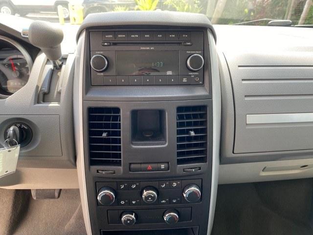 2010 Dark Titanium Metallic /Medium Slate Gray/Light Shale Dodge Grand Caravan SE LOW MILES 36,541 (2D4RN4DE9AR) with an 3.3L OHV V6 Engine engine, Automatic transmission, located at 4701 North Dixie Hwy, Pompano Beach, FL, 33064, (954) 422-2889, 26.240938, -80.123474 - OUR WEBPAGE FLORIDACARS1.COM HAS OVER 100 PHOTOS AND FREE CARFAX LINK 2010 Dodge Grand Caravan SE Van 3.3L V6 F OHV 12V Gasoline 24 MPG Front Wheel Drive Features ABS Brakes Air Conditioning AM/FM Stereo Automatic Transmission Auxiliary Audio Input CD Audio Cloth Seats Cruise Control Flex Fuel Vehic- Photo#56