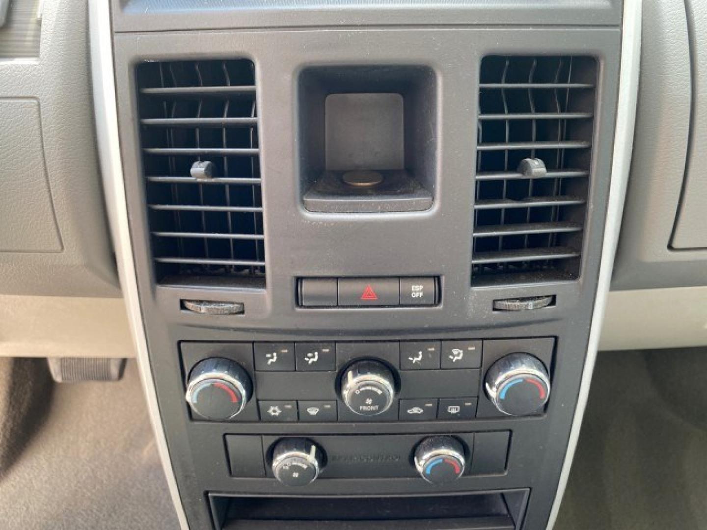 2010 Dark Titanium Metallic /Medium Slate Gray/Light Shale Dodge Grand Caravan SE LOW MILES 36,541 (2D4RN4DE9AR) with an 3.3L OHV V6 Engine engine, Automatic transmission, located at 4701 North Dixie Hwy, Pompano Beach, FL, 33064, (954) 422-2889, 26.240938, -80.123474 - OUR WEBPAGE FLORIDACARS1.COM HAS OVER 100 PHOTOS AND FREE CARFAX LINK 2010 Dodge Grand Caravan SE Van 3.3L V6 F OHV 12V Gasoline 24 MPG Front Wheel Drive Features ABS Brakes Air Conditioning AM/FM Stereo Automatic Transmission Auxiliary Audio Input CD Audio Cloth Seats Cruise Control Flex Fuel Vehic- Photo#58