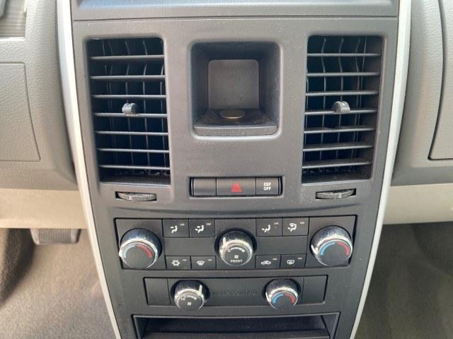 2010 Dark Titanium Metallic /Medium Slate Gray/Light Shale Dodge Grand Caravan SE LOW MILES 36,541 (2D4RN4DE9AR) with an 3.3L OHV V6 Engine engine, Automatic transmission, located at 4701 North Dixie Hwy, Pompano Beach, FL, 33064, (954) 422-2889, 26.240938, -80.123474 - OUR WEBPAGE FLORIDACARS1.COM HAS OVER 100 PHOTOS AND FREE CARFAX LINK 2010 Dodge Grand Caravan SE Van 3.3L V6 F OHV 12V Gasoline 24 MPG Front Wheel Drive Features ABS Brakes Air Conditioning AM/FM Stereo Automatic Transmission Auxiliary Audio Input CD Audio Cloth Seats Cruise Control Flex Fuel Vehic- Photo#58