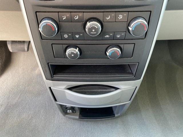 2010 Dark Titanium Metallic /Medium Slate Gray/Light Shale Dodge Grand Caravan SE LOW MILES 36,541 (2D4RN4DE9AR) with an 3.3L OHV V6 Engine engine, Automatic transmission, located at 4701 North Dixie Hwy, Pompano Beach, FL, 33064, (954) 422-2889, 26.240938, -80.123474 - OUR WEBPAGE FLORIDACARS1.COM HAS OVER 100 PHOTOS AND FREE CARFAX LINK 2010 Dodge Grand Caravan SE Van 3.3L V6 F OHV 12V Gasoline 24 MPG Front Wheel Drive Features ABS Brakes Air Conditioning AM/FM Stereo Automatic Transmission Auxiliary Audio Input CD Audio Cloth Seats Cruise Control Flex Fuel Vehic- Photo#59