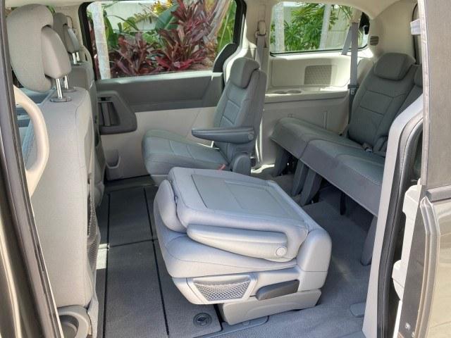 2010 Dark Titanium Metallic /Medium Slate Gray/Light Shale Dodge Grand Caravan SE LOW MILES 36,541 (2D4RN4DE9AR) with an 3.3L OHV V6 Engine engine, Automatic transmission, located at 4701 North Dixie Hwy, Pompano Beach, FL, 33064, (954) 422-2889, 26.240938, -80.123474 - OUR WEBPAGE FLORIDACARS1.COM HAS OVER 100 PHOTOS AND FREE CARFAX LINK 2010 Dodge Grand Caravan SE Van 3.3L V6 F OHV 12V Gasoline 24 MPG Front Wheel Drive Features ABS Brakes Air Conditioning AM/FM Stereo Automatic Transmission Auxiliary Audio Input CD Audio Cloth Seats Cruise Control Flex Fuel Vehic- Photo#80