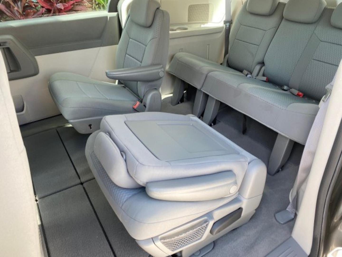 2010 Dark Titanium Metallic /Medium Slate Gray/Light Shale Dodge Grand Caravan SE LOW MILES 36,541 (2D4RN4DE9AR) with an 3.3L OHV V6 Engine engine, Automatic transmission, located at 4701 North Dixie Hwy, Pompano Beach, FL, 33064, (954) 422-2889, 26.240938, -80.123474 - OUR WEBPAGE FLORIDACARS1.COM HAS OVER 100 PHOTOS AND FREE CARFAX LINK 2010 Dodge Grand Caravan SE Van 3.3L V6 F OHV 12V Gasoline 24 MPG Front Wheel Drive Features ABS Brakes Air Conditioning AM/FM Stereo Automatic Transmission Auxiliary Audio Input CD Audio Cloth Seats Cruise Control Flex Fuel Vehic- Photo#81