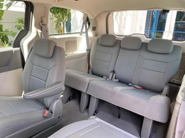 2010 Dark Titanium Metallic /Medium Slate Gray/Light Shale Dodge Grand Caravan SE LOW MILES 36,541 (2D4RN4DE9AR) with an 3.3L OHV V6 Engine engine, Automatic transmission, located at 4701 North Dixie Hwy, Pompano Beach, FL, 33064, (954) 422-2889, 26.240938, -80.123474 - OUR WEBPAGE FLORIDACARS1.COM HAS OVER 100 PHOTOS AND FREE CARFAX LINK 2010 Dodge Grand Caravan SE Van 3.3L V6 F OHV 12V Gasoline 24 MPG Front Wheel Drive Features ABS Brakes Air Conditioning AM/FM Stereo Automatic Transmission Auxiliary Audio Input CD Audio Cloth Seats Cruise Control Flex Fuel Vehic- Photo#83