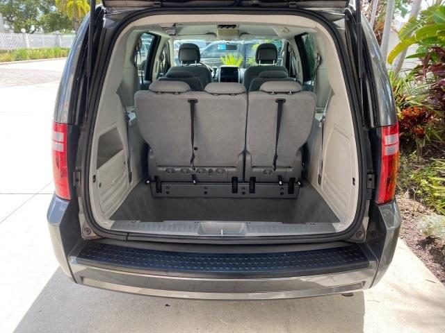 2010 Dark Titanium Metallic /Medium Slate Gray/Light Shale Dodge Grand Caravan SE LOW MILES 36,541 (2D4RN4DE9AR) with an 3.3L OHV V6 Engine engine, Automatic transmission, located at 4701 North Dixie Hwy, Pompano Beach, FL, 33064, (954) 422-2889, 26.240938, -80.123474 - OUR WEBPAGE FLORIDACARS1.COM HAS OVER 100 PHOTOS AND FREE CARFAX LINK 2010 Dodge Grand Caravan SE Van 3.3L V6 F OHV 12V Gasoline 24 MPG Front Wheel Drive Features ABS Brakes Air Conditioning AM/FM Stereo Automatic Transmission Auxiliary Audio Input CD Audio Cloth Seats Cruise Control Flex Fuel Vehic- Photo#95