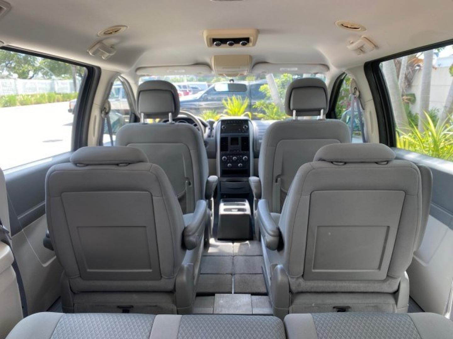 2010 Dark Titanium Metallic /Medium Slate Gray/Light Shale Dodge Grand Caravan SE LOW MILES 36,541 (2D4RN4DE9AR) with an 3.3L OHV V6 Engine engine, Automatic transmission, located at 4701 North Dixie Hwy, Pompano Beach, FL, 33064, (954) 422-2889, 26.240938, -80.123474 - OUR WEBPAGE FLORIDACARS1.COM HAS OVER 100 PHOTOS AND FREE CARFAX LINK 2010 Dodge Grand Caravan SE Van 3.3L V6 F OHV 12V Gasoline 24 MPG Front Wheel Drive Features ABS Brakes Air Conditioning AM/FM Stereo Automatic Transmission Auxiliary Audio Input CD Audio Cloth Seats Cruise Control Flex Fuel Vehic- Photo#99
