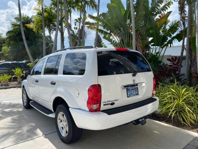 2004 Bright White /Med Slate Gray Dodge Durango Limited LOW MILES 55,294 (1D4HD58N24F) with an 4.7L V8 Magnum Engine engine, Automatic transmission, located at 4701 North Dixie Hwy, Pompano Beach, FL, 33064, (954) 422-2889, 26.240938, -80.123474 - OUR WEBPAGE FLORIDACARS1.COM HAS OVER 100 PHOTOS AND FREE CARFAX LINK 2004 Dodge Durango Limited 4 Door Wagon/Sport Utility 4.7L V8 F Gasoline 18 MPG Rear Wheel Drive Features ABS Brakes Air Conditioning Alloy Wheels AM/FM Stereo Automatic Transmission CD Audio Cruise Control Fold-Away Third Row Lea- Photo#5