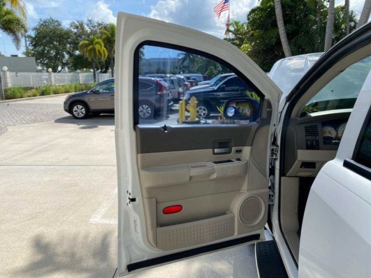 2004 Bright White /Med Slate Gray Dodge Durango Limited LOW MILES 55,294 (1D4HD58N24F) with an 4.7L V8 Magnum Engine engine, Automatic transmission, located at 4701 North Dixie Hwy, Pompano Beach, FL, 33064, (954) 422-2889, 26.240938, -80.123474 - OUR WEBPAGE FLORIDACARS1.COM HAS OVER 100 PHOTOS AND FREE CARFAX LINK 2004 Dodge Durango Limited 4 Door Wagon/Sport Utility 4.7L V8 F Gasoline 18 MPG Rear Wheel Drive Features ABS Brakes Air Conditioning Alloy Wheels AM/FM Stereo Automatic Transmission CD Audio Cruise Control Fold-Away Third Row Lea- Photo#9