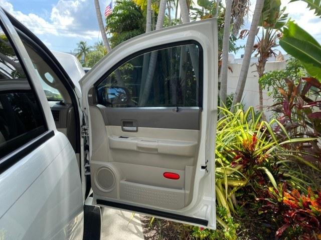 2004 Bright White /Med Slate Gray Dodge Durango Limited LOW MILES 55,294 (1D4HD58N24F) with an 4.7L V8 Magnum Engine engine, Automatic transmission, located at 4701 North Dixie Hwy, Pompano Beach, FL, 33064, (954) 422-2889, 26.240938, -80.123474 - OUR WEBPAGE FLORIDACARS1.COM HAS OVER 100 PHOTOS AND FREE CARFAX LINK 2004 Dodge Durango Limited 4 Door Wagon/Sport Utility 4.7L V8 F Gasoline 18 MPG Rear Wheel Drive Features ABS Brakes Air Conditioning Alloy Wheels AM/FM Stereo Automatic Transmission CD Audio Cruise Control Fold-Away Third Row Lea- Photo#11