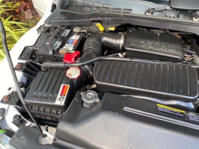 2004 Bright White /Med Slate Gray Dodge Durango Limited LOW MILES 55,294 (1D4HD58N24F) with an 4.7L V8 Magnum Engine engine, Automatic transmission, located at 4701 North Dixie Hwy, Pompano Beach, FL, 33064, (954) 422-2889, 26.240938, -80.123474 - OUR WEBPAGE FLORIDACARS1.COM HAS OVER 100 PHOTOS AND FREE CARFAX LINK 2004 Dodge Durango Limited 4 Door Wagon/Sport Utility 4.7L V8 F Gasoline 18 MPG Rear Wheel Drive Features ABS Brakes Air Conditioning Alloy Wheels AM/FM Stereo Automatic Transmission CD Audio Cruise Control Fold-Away Third Row Lea- Photo#24