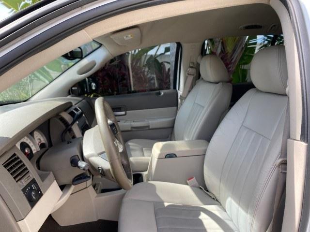 2004 Bright White /Med Slate Gray Dodge Durango Limited LOW MILES 55,294 (1D4HD58N24F) with an 4.7L V8 Magnum Engine engine, Automatic transmission, located at 4701 North Dixie Hwy, Pompano Beach, FL, 33064, (954) 422-2889, 26.240938, -80.123474 - OUR WEBPAGE FLORIDACARS1.COM HAS OVER 100 PHOTOS AND FREE CARFAX LINK 2004 Dodge Durango Limited 4 Door Wagon/Sport Utility 4.7L V8 F Gasoline 18 MPG Rear Wheel Drive Features ABS Brakes Air Conditioning Alloy Wheels AM/FM Stereo Automatic Transmission CD Audio Cruise Control Fold-Away Third Row Lea- Photo#43