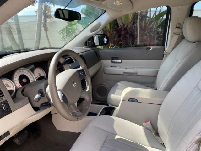 2004 Bright White /Med Slate Gray Dodge Durango Limited LOW MILES 55,294 (1D4HD58N24F) with an 4.7L V8 Magnum Engine engine, Automatic transmission, located at 4701 North Dixie Hwy, Pompano Beach, FL, 33064, (954) 422-2889, 26.240938, -80.123474 - OUR WEBPAGE FLORIDACARS1.COM HAS OVER 100 PHOTOS AND FREE CARFAX LINK 2004 Dodge Durango Limited 4 Door Wagon/Sport Utility 4.7L V8 F Gasoline 18 MPG Rear Wheel Drive Features ABS Brakes Air Conditioning Alloy Wheels AM/FM Stereo Automatic Transmission CD Audio Cruise Control Fold-Away Third Row Lea- Photo#45