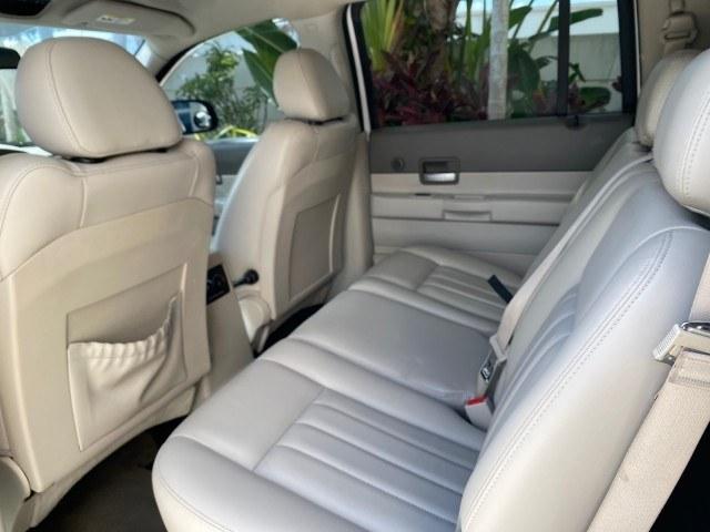 2004 Bright White /Med Slate Gray Dodge Durango Limited LOW MILES 55,294 (1D4HD58N24F) with an 4.7L V8 Magnum Engine engine, Automatic transmission, located at 4701 North Dixie Hwy, Pompano Beach, FL, 33064, (954) 422-2889, 26.240938, -80.123474 - OUR WEBPAGE FLORIDACARS1.COM HAS OVER 100 PHOTOS AND FREE CARFAX LINK 2004 Dodge Durango Limited 4 Door Wagon/Sport Utility 4.7L V8 F Gasoline 18 MPG Rear Wheel Drive Features ABS Brakes Air Conditioning Alloy Wheels AM/FM Stereo Automatic Transmission CD Audio Cruise Control Fold-Away Third Row Lea- Photo#77