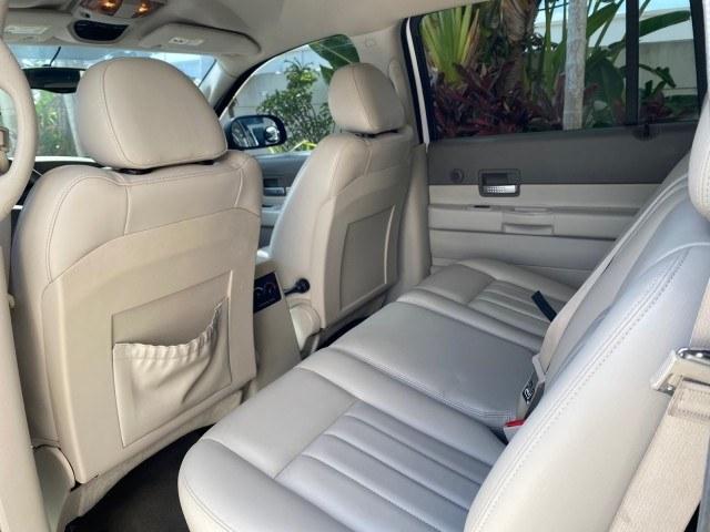 2004 Bright White /Med Slate Gray Dodge Durango Limited LOW MILES 55,294 (1D4HD58N24F) with an 4.7L V8 Magnum Engine engine, Automatic transmission, located at 4701 North Dixie Hwy, Pompano Beach, FL, 33064, (954) 422-2889, 26.240938, -80.123474 - OUR WEBPAGE FLORIDACARS1.COM HAS OVER 100 PHOTOS AND FREE CARFAX LINK 2004 Dodge Durango Limited 4 Door Wagon/Sport Utility 4.7L V8 F Gasoline 18 MPG Rear Wheel Drive Features ABS Brakes Air Conditioning Alloy Wheels AM/FM Stereo Automatic Transmission CD Audio Cruise Control Fold-Away Third Row Lea- Photo#78