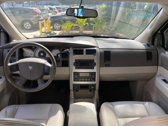2004 Bright White /Med Slate Gray Dodge Durango Limited LOW MILES 55,294 (1D4HD58N24F) with an 4.7L V8 Magnum Engine engine, Automatic transmission, located at 4701 North Dixie Hwy, Pompano Beach, FL, 33064, (954) 422-2889, 26.240938, -80.123474 - OUR WEBPAGE FLORIDACARS1.COM HAS OVER 100 PHOTOS AND FREE CARFAX LINK 2004 Dodge Durango Limited 4 Door Wagon/Sport Utility 4.7L V8 F Gasoline 18 MPG Rear Wheel Drive Features ABS Brakes Air Conditioning Alloy Wheels AM/FM Stereo Automatic Transmission CD Audio Cruise Control Fold-Away Third Row Lea- Photo#81