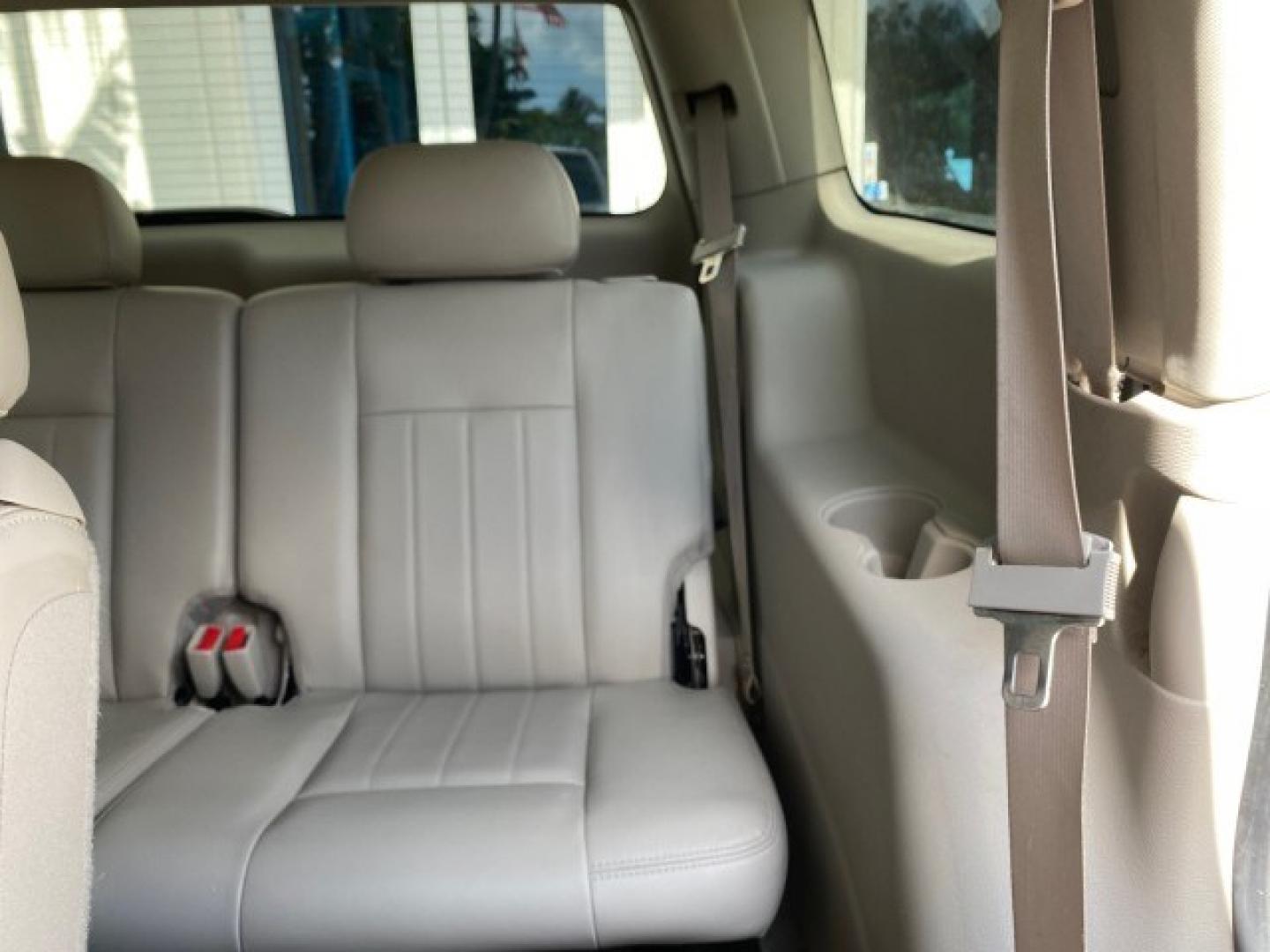 2004 Bright White /Med Slate Gray Dodge Durango Limited LOW MILES 55,294 (1D4HD58N24F) with an 4.7L V8 Magnum Engine engine, Automatic transmission, located at 4701 North Dixie Hwy, Pompano Beach, FL, 33064, (954) 422-2889, 26.240938, -80.123474 - OUR WEBPAGE FLORIDACARS1.COM HAS OVER 100 PHOTOS AND FREE CARFAX LINK 2004 Dodge Durango Limited 4 Door Wagon/Sport Utility 4.7L V8 F Gasoline 18 MPG Rear Wheel Drive Features ABS Brakes Air Conditioning Alloy Wheels AM/FM Stereo Automatic Transmission CD Audio Cruise Control Fold-Away Third Row Lea- Photo#86