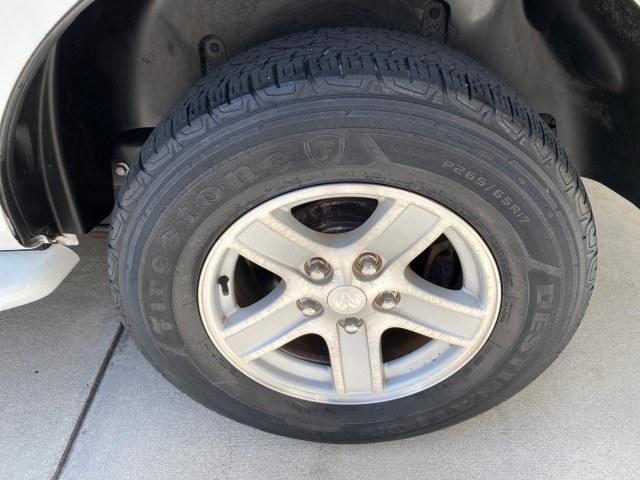 2004 Bright White /Med Slate Gray Dodge Durango Limited LOW MILES 55,294 (1D4HD58N24F) with an 4.7L V8 Magnum Engine engine, Automatic transmission, located at 4701 North Dixie Hwy, Pompano Beach, FL, 33064, (954) 422-2889, 26.240938, -80.123474 - OUR WEBPAGE FLORIDACARS1.COM HAS OVER 100 PHOTOS AND FREE CARFAX LINK 2004 Dodge Durango Limited 4 Door Wagon/Sport Utility 4.7L V8 F Gasoline 18 MPG Rear Wheel Drive Features ABS Brakes Air Conditioning Alloy Wheels AM/FM Stereo Automatic Transmission CD Audio Cruise Control Fold-Away Third Row Lea- Photo#91