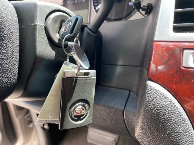 2008 Quicksilver /Ebony/Ebony Cadillac Escalade SUNROOF DVD LOW MILES 71,690 (1GYEC63848R) with an 6.2L Vortec 1000 VVT V8 SFI Engine engine, Automatic transmission, located at 4701 North Dixie Hwy, Pompano Beach, FL, 33064, (954) 422-2889, 26.240938, -80.123474 - OUR WEBPAGE FLORIDACARS1.COM HAS OVER 100 PHOTOS AND FREE CARFAX LINK 2008 Cadillac Escalade 4 Door Wagon/Sport Utility 6.2L V8 F Gasoline 19 MPG Rear Wheel Drive Features 20 Inch Plus Wheels A/C Seat(s) ABS Brakes Air Conditioning Alloy Wheels AM/FM Stereo Automatic Transmission Auxiliary Audio Inp- Photo#59
