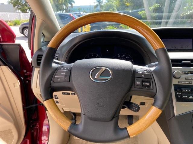 2011 Matador Red Mica /Parchment Lexus RX 350 LOW MILES 34,850 1 OWNER (2T2ZK1BA0BC) with an 3.5L DOHC SFI 24-Valve V6 Engine engine, Automatic transmission, located at 4701 North Dixie Hwy, Pompano Beach, FL, 33064, (954) 422-2889, 26.240938, -80.123474 - OUR WEBPAGE FLORIDACARS1.COM HAS OVER 100 PHOTOS AND FREE CARFAX LINK 2011 Lexus RX 350 1 OWNER 4 Door Wagon/Sport Utility 3.5L V6 F DOHC 24V Gasoline 25 MPG Front Wheel Drive Features ABS Brakes Air Conditioning Alloy Wheels AM/FM Stereo Automatic Transmission Auxiliary Audio Input Bluetooth Techno- Photo#50
