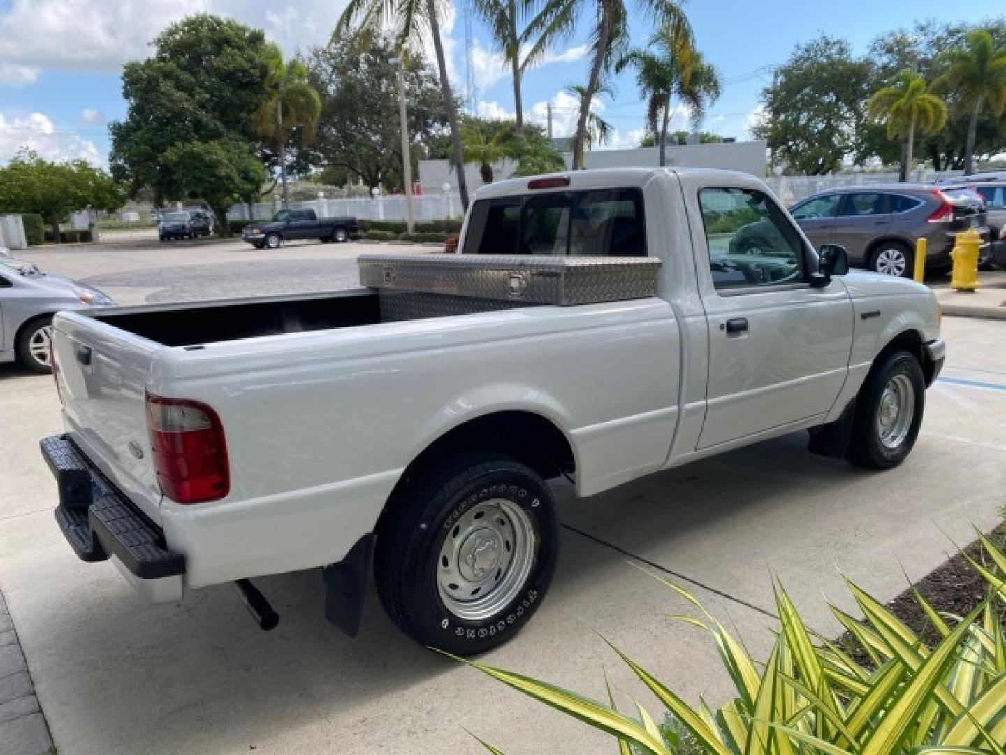 2002 Oxford White /Dark Graphite Ford Ranger XL AUTO AC LOW MILES 40,403 (1FTYR10D42T) with an 2.3L DOHC SEFI 16-Valve 4-Cyl Engine engine, Automatic transmission, located at 4701 North Dixie Hwy, Pompano Beach, FL, 33064, (954) 422-2889, 26.240938, -80.123474 - OUR WEBPAGE FLORIDACARS1.COM HAS OVER 100 PHOTOS AND FREE CARFAX LINK 2002 Ford Ranger XL Pickup 2.3L I4 F Gasoline 28 MPG Rear Wheel Drive Features ABS Brakes Air Conditioning AM/FM Stereo Automatic Transmission Vinyl Seats Power Locks Power Mirrors Power Windows 2002 Ford Ranger XL is a fantastic- Photo#7