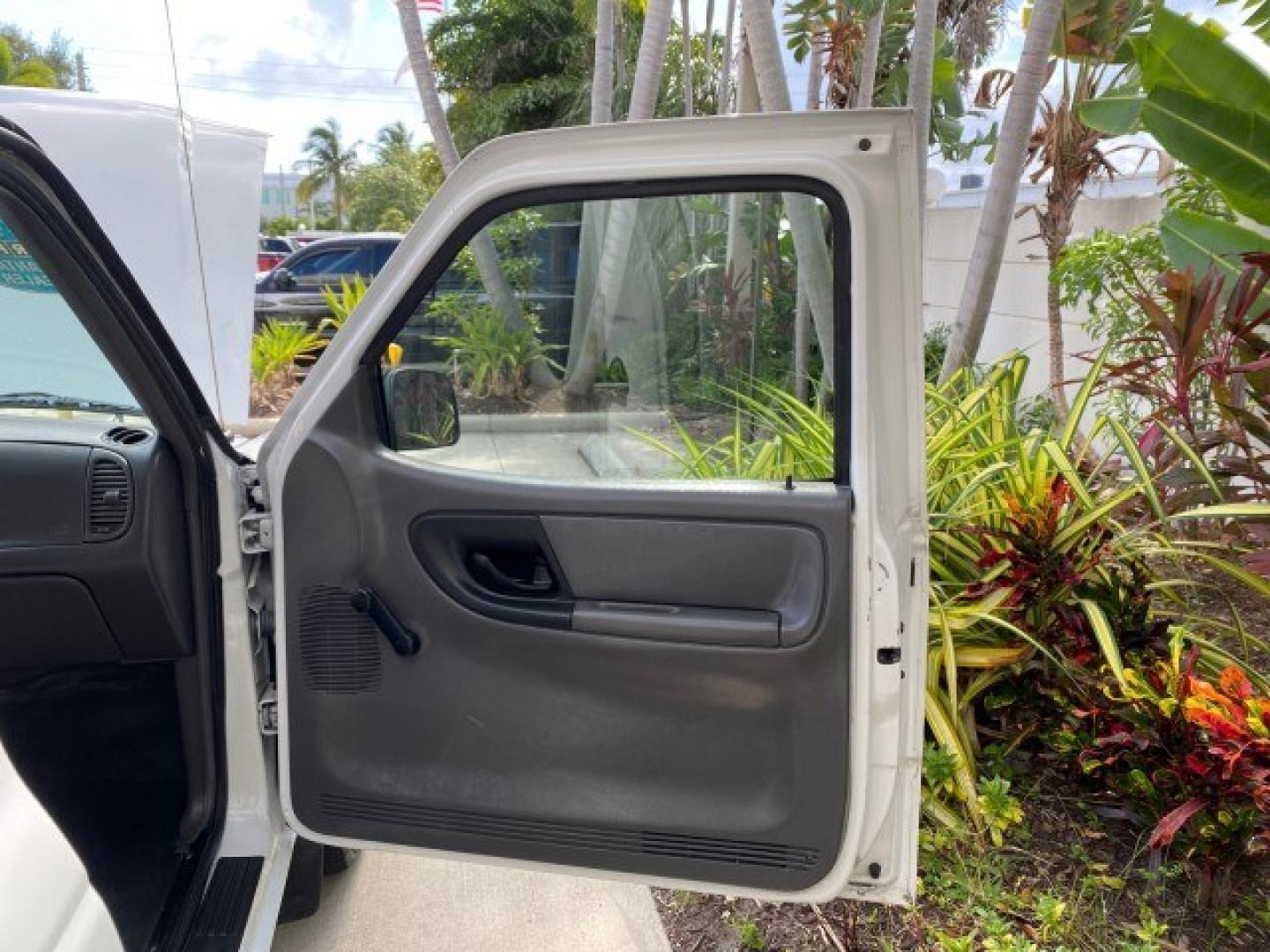2002 Oxford White /Dark Graphite Ford Ranger XL AUTO AC LOW MILES 40,403 (1FTYR10D42T) with an 2.3L DOHC SEFI 16-Valve 4-Cyl Engine engine, Automatic transmission, located at 4701 North Dixie Hwy, Pompano Beach, FL, 33064, (954) 422-2889, 26.240938, -80.123474 - OUR WEBPAGE FLORIDACARS1.COM HAS OVER 100 PHOTOS AND FREE CARFAX LINK 2002 Ford Ranger XL Pickup 2.3L I4 F Gasoline 28 MPG Rear Wheel Drive Features ABS Brakes Air Conditioning AM/FM Stereo Automatic Transmission Vinyl Seats Power Locks Power Mirrors Power Windows 2002 Ford Ranger XL is a fantastic- Photo#11