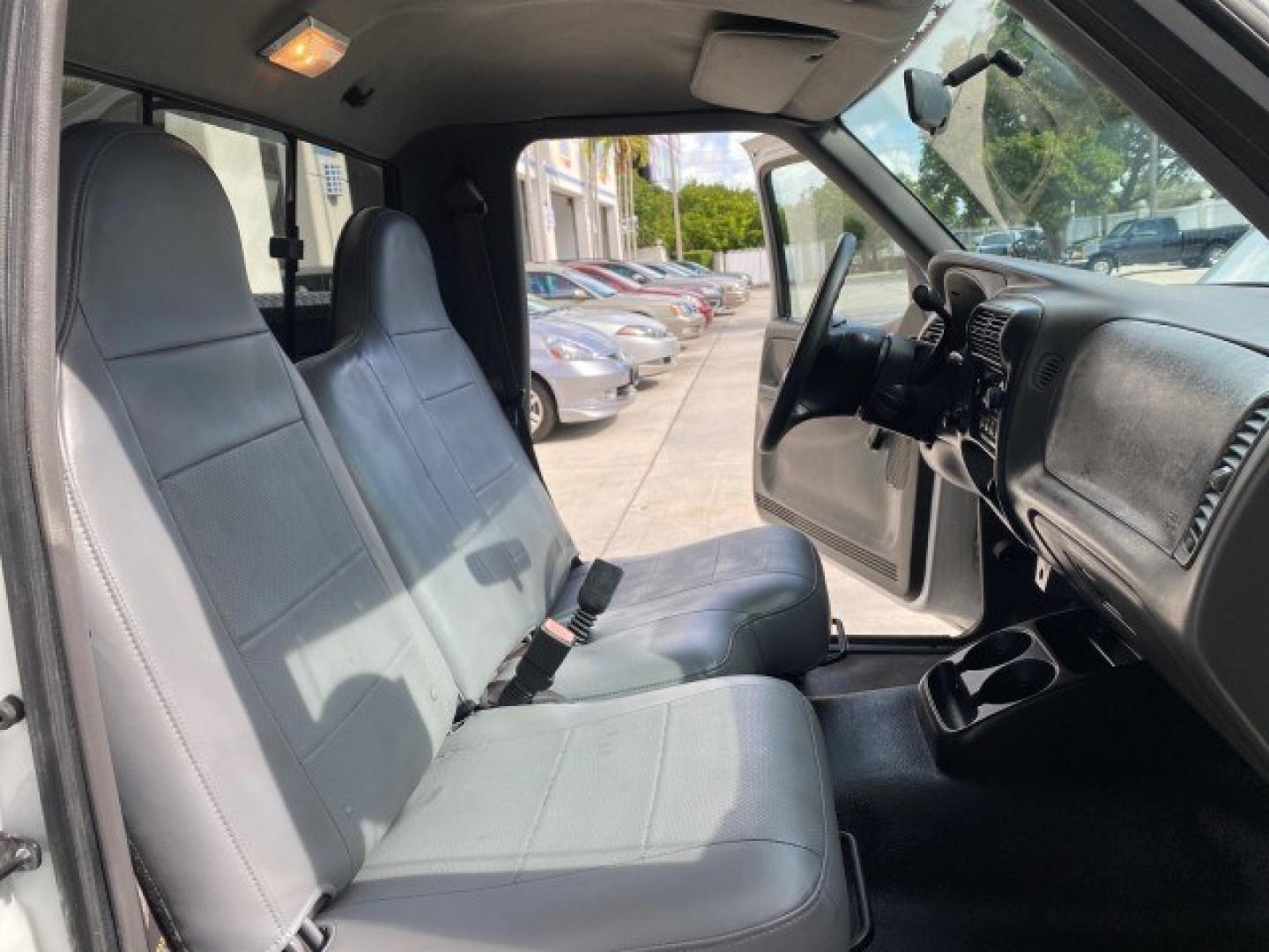 2002 Oxford White /Dark Graphite Ford Ranger XL AUTO AC LOW MILES 40,403 (1FTYR10D42T) with an 2.3L DOHC SEFI 16-Valve 4-Cyl Engine engine, Automatic transmission, located at 4701 North Dixie Hwy, Pompano Beach, FL, 33064, (954) 422-2889, 26.240938, -80.123474 - OUR WEBPAGE FLORIDACARS1.COM HAS OVER 100 PHOTOS AND FREE CARFAX LINK 2002 Ford Ranger XL Pickup 2.3L I4 F Gasoline 28 MPG Rear Wheel Drive Features ABS Brakes Air Conditioning AM/FM Stereo Automatic Transmission Vinyl Seats Power Locks Power Mirrors Power Windows 2002 Ford Ranger XL is a fantastic- Photo#12