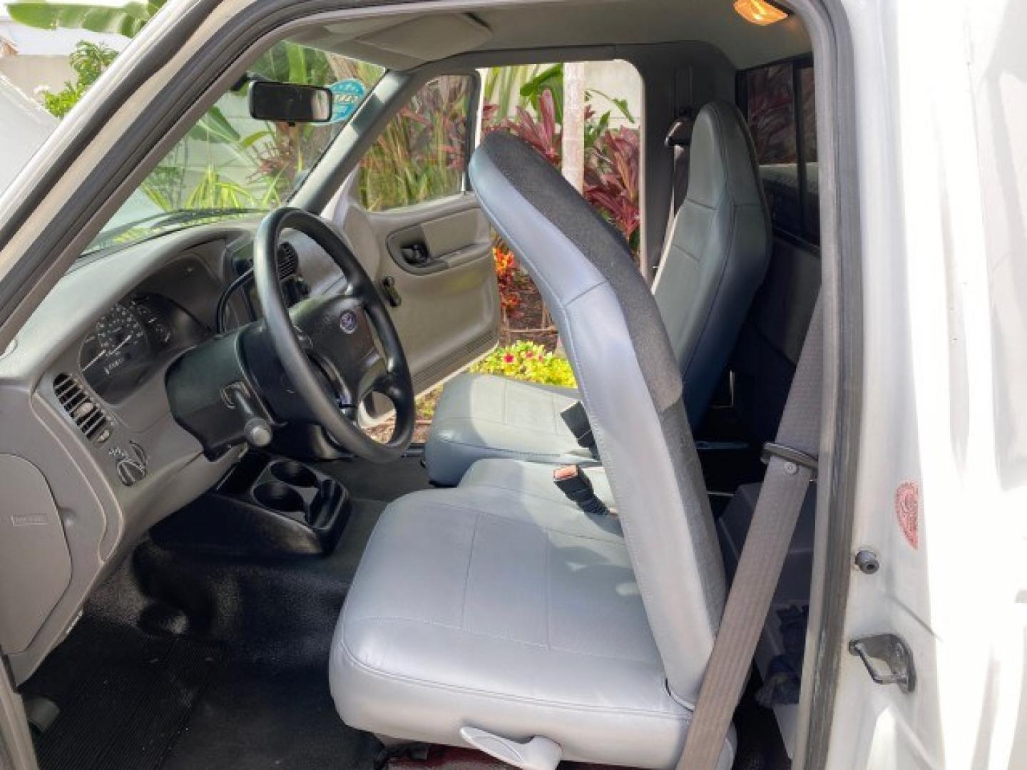 2002 Oxford White /Dark Graphite Ford Ranger XL AUTO AC LOW MILES 40,403 (1FTYR10D42T) with an 2.3L DOHC SEFI 16-Valve 4-Cyl Engine engine, Automatic transmission, located at 4701 North Dixie Hwy, Pompano Beach, FL, 33064, (954) 422-2889, 26.240938, -80.123474 - OUR WEBPAGE FLORIDACARS1.COM HAS OVER 100 PHOTOS AND FREE CARFAX LINK 2002 Ford Ranger XL Pickup 2.3L I4 F Gasoline 28 MPG Rear Wheel Drive Features ABS Brakes Air Conditioning AM/FM Stereo Automatic Transmission Vinyl Seats Power Locks Power Mirrors Power Windows 2002 Ford Ranger XL is a fantastic- Photo#13