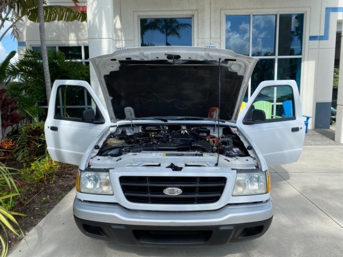 2002 Oxford White /Dark Graphite Ford Ranger XL AUTO AC LOW MILES 40,403 (1FTYR10D42T) with an 2.3L DOHC SEFI 16-Valve 4-Cyl Engine engine, Automatic transmission, located at 4701 North Dixie Hwy, Pompano Beach, FL, 33064, (954) 422-2889, 26.240938, -80.123474 - OUR WEBPAGE FLORIDACARS1.COM HAS OVER 100 PHOTOS AND FREE CARFAX LINK 2002 Ford Ranger XL Pickup 2.3L I4 F Gasoline 28 MPG Rear Wheel Drive Features ABS Brakes Air Conditioning AM/FM Stereo Automatic Transmission Vinyl Seats Power Locks Power Mirrors Power Windows 2002 Ford Ranger XL is a fantastic- Photo#17
