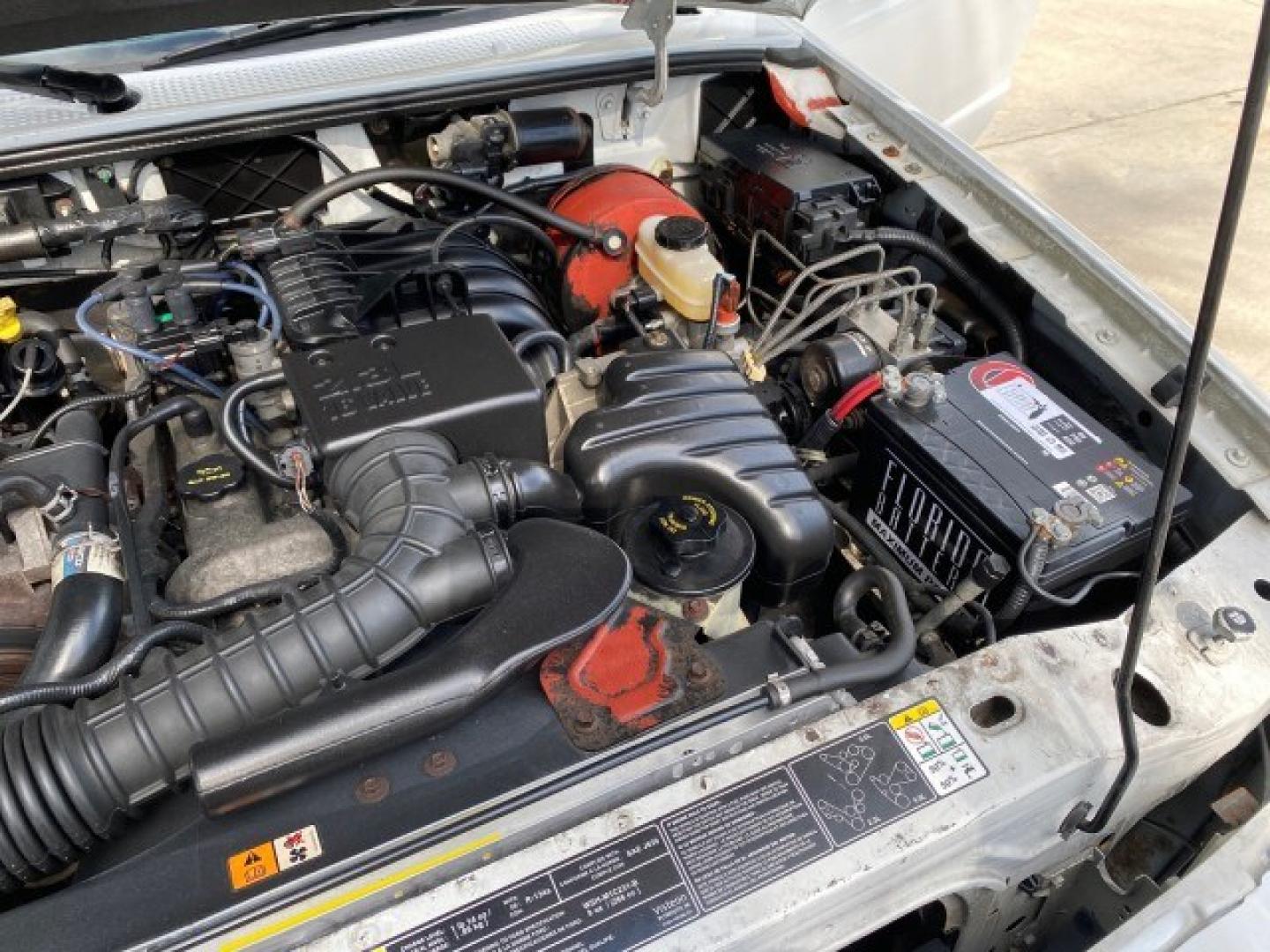 2002 Oxford White /Dark Graphite Ford Ranger XL AUTO AC LOW MILES 40,403 (1FTYR10D42T) with an 2.3L DOHC SEFI 16-Valve 4-Cyl Engine engine, Automatic transmission, located at 4701 North Dixie Hwy, Pompano Beach, FL, 33064, (954) 422-2889, 26.240938, -80.123474 - OUR WEBPAGE FLORIDACARS1.COM HAS OVER 100 PHOTOS AND FREE CARFAX LINK 2002 Ford Ranger XL Pickup 2.3L I4 F Gasoline 28 MPG Rear Wheel Drive Features ABS Brakes Air Conditioning AM/FM Stereo Automatic Transmission Vinyl Seats Power Locks Power Mirrors Power Windows 2002 Ford Ranger XL is a fantastic- Photo#25