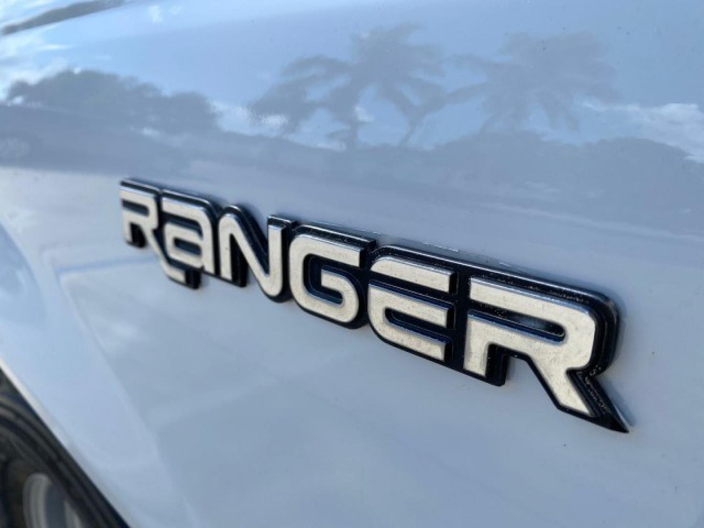 2002 Oxford White /Dark Graphite Ford Ranger XL AUTO AC LOW MILES 40,403 (1FTYR10D42T) with an 2.3L DOHC SEFI 16-Valve 4-Cyl Engine engine, Automatic transmission, located at 4701 North Dixie Hwy, Pompano Beach, FL, 33064, (954) 422-2889, 26.240938, -80.123474 - OUR WEBPAGE FLORIDACARS1.COM HAS OVER 100 PHOTOS AND FREE CARFAX LINK 2002 Ford Ranger XL Pickup 2.3L I4 F Gasoline 28 MPG Rear Wheel Drive Features ABS Brakes Air Conditioning AM/FM Stereo Automatic Transmission Vinyl Seats Power Locks Power Mirrors Power Windows 2002 Ford Ranger XL is a fantastic- Photo#40