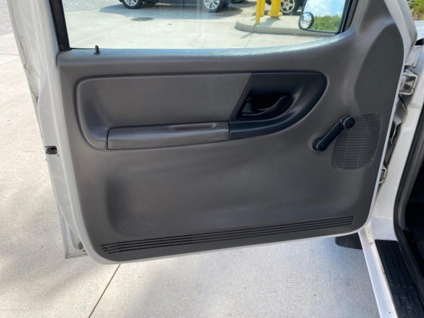 2002 Oxford White /Dark Graphite Ford Ranger XL AUTO AC LOW MILES 40,403 (1FTYR10D42T) with an 2.3L DOHC SEFI 16-Valve 4-Cyl Engine engine, Automatic transmission, located at 4701 North Dixie Hwy, Pompano Beach, FL, 33064, (954) 422-2889, 26.240938, -80.123474 - OUR WEBPAGE FLORIDACARS1.COM HAS OVER 100 PHOTOS AND FREE CARFAX LINK 2002 Ford Ranger XL Pickup 2.3L I4 F Gasoline 28 MPG Rear Wheel Drive Features ABS Brakes Air Conditioning AM/FM Stereo Automatic Transmission Vinyl Seats Power Locks Power Mirrors Power Windows 2002 Ford Ranger XL is a fantastic- Photo#41