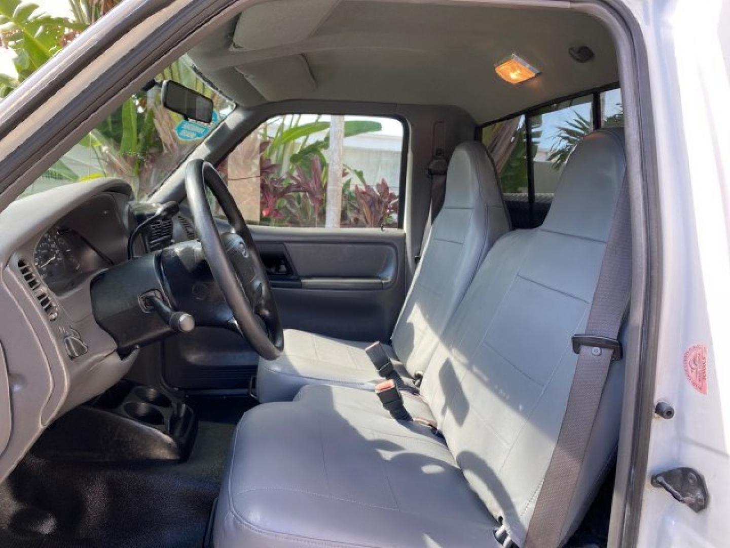 2002 Oxford White /Dark Graphite Ford Ranger XL AUTO AC LOW MILES 40,403 (1FTYR10D42T) with an 2.3L DOHC SEFI 16-Valve 4-Cyl Engine engine, Automatic transmission, located at 4701 North Dixie Hwy, Pompano Beach, FL, 33064, (954) 422-2889, 26.240938, -80.123474 - OUR WEBPAGE FLORIDACARS1.COM HAS OVER 100 PHOTOS AND FREE CARFAX LINK 2002 Ford Ranger XL Pickup 2.3L I4 F Gasoline 28 MPG Rear Wheel Drive Features ABS Brakes Air Conditioning AM/FM Stereo Automatic Transmission Vinyl Seats Power Locks Power Mirrors Power Windows 2002 Ford Ranger XL is a fantastic- Photo#43