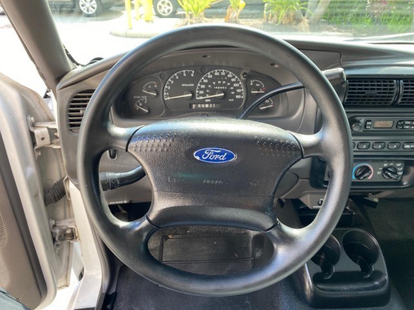 2002 Oxford White /Dark Graphite Ford Ranger XL AUTO AC LOW MILES 40,403 (1FTYR10D42T) with an 2.3L DOHC SEFI 16-Valve 4-Cyl Engine engine, Automatic transmission, located at 4701 North Dixie Hwy, Pompano Beach, FL, 33064, (954) 422-2889, 26.240938, -80.123474 - OUR WEBPAGE FLORIDACARS1.COM HAS OVER 100 PHOTOS AND FREE CARFAX LINK 2002 Ford Ranger XL Pickup 2.3L I4 F Gasoline 28 MPG Rear Wheel Drive Features ABS Brakes Air Conditioning AM/FM Stereo Automatic Transmission Vinyl Seats Power Locks Power Mirrors Power Windows 2002 Ford Ranger XL is a fantastic- Photo#49