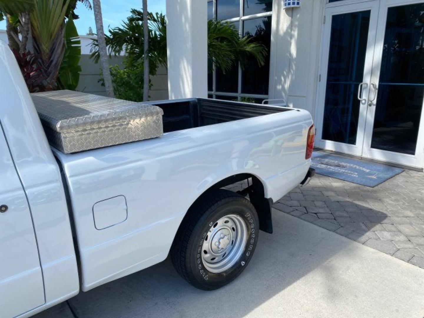 2002 Oxford White /Dark Graphite Ford Ranger XL AUTO AC LOW MILES 40,403 (1FTYR10D42T) with an 2.3L DOHC SEFI 16-Valve 4-Cyl Engine engine, Automatic transmission, located at 4701 North Dixie Hwy, Pompano Beach, FL, 33064, (954) 422-2889, 26.240938, -80.123474 - OUR WEBPAGE FLORIDACARS1.COM HAS OVER 100 PHOTOS AND FREE CARFAX LINK 2002 Ford Ranger XL Pickup 2.3L I4 F Gasoline 28 MPG Rear Wheel Drive Features ABS Brakes Air Conditioning AM/FM Stereo Automatic Transmission Vinyl Seats Power Locks Power Mirrors Power Windows 2002 Ford Ranger XL is a fantastic- Photo#72