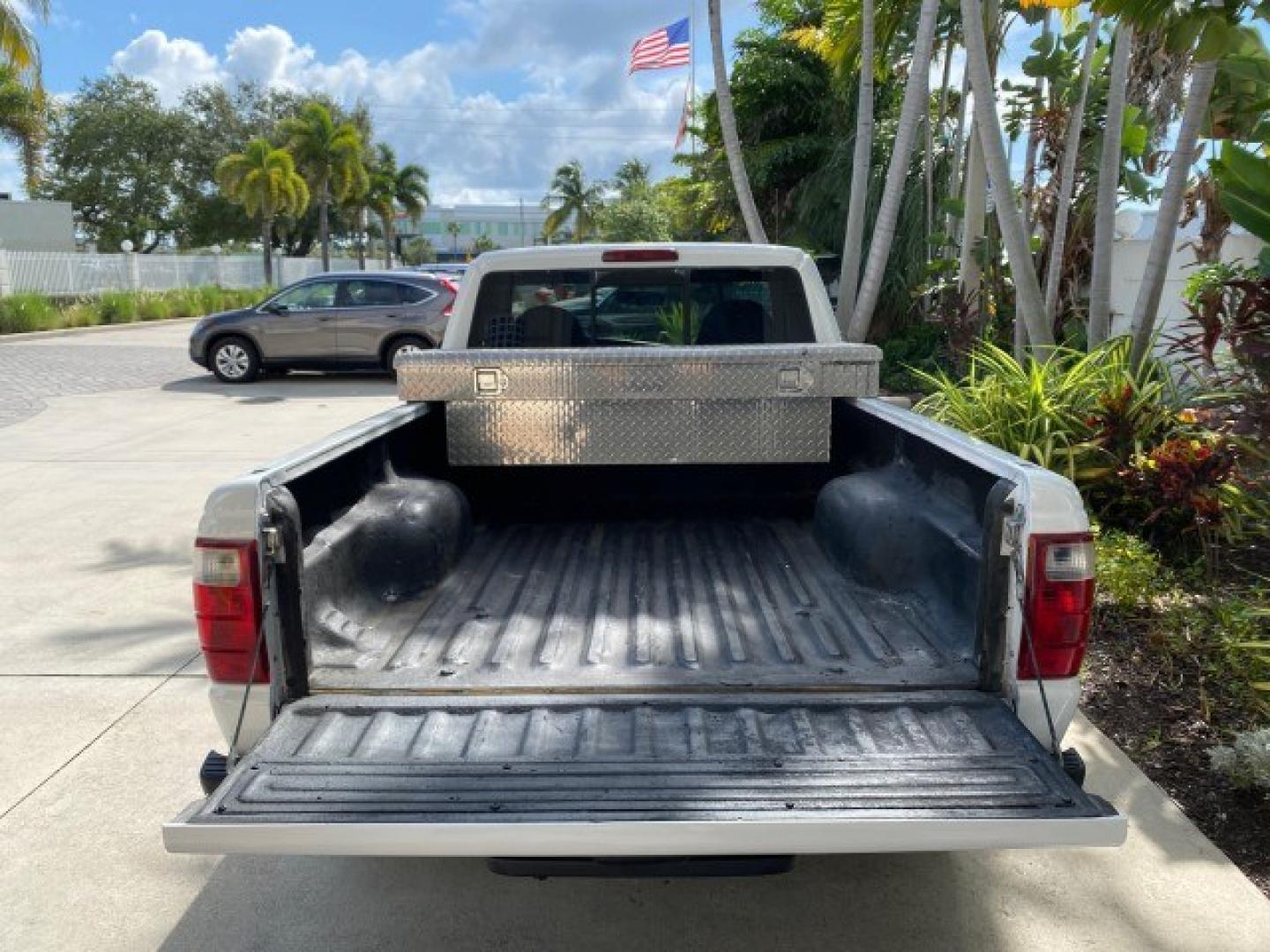 2002 Oxford White /Dark Graphite Ford Ranger XL AUTO AC LOW MILES 40,403 (1FTYR10D42T) with an 2.3L DOHC SEFI 16-Valve 4-Cyl Engine engine, Automatic transmission, located at 4701 North Dixie Hwy, Pompano Beach, FL, 33064, (954) 422-2889, 26.240938, -80.123474 - OUR WEBPAGE FLORIDACARS1.COM HAS OVER 100 PHOTOS AND FREE CARFAX LINK 2002 Ford Ranger XL Pickup 2.3L I4 F Gasoline 28 MPG Rear Wheel Drive Features ABS Brakes Air Conditioning AM/FM Stereo Automatic Transmission Vinyl Seats Power Locks Power Mirrors Power Windows 2002 Ford Ranger XL is a fantastic- Photo#86